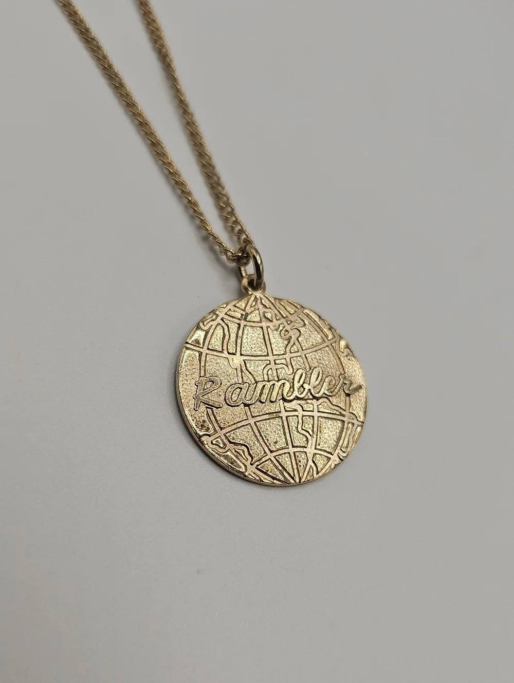 Vintage Nash Rambler Gold-Tone Globe Charm Globe Logo